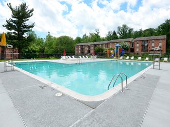 Poolside Relaxing Area at Painters Mill Apartments, Randallstown, Maryland, 21117